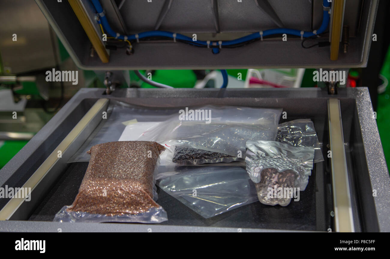 Automatic Heat Sealing Vacuum Machine for food industry Stock Photo - Alamy