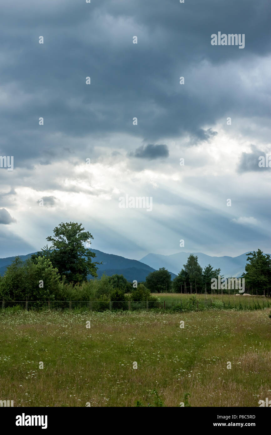 dramatic dark clouds landscape Stock Photo