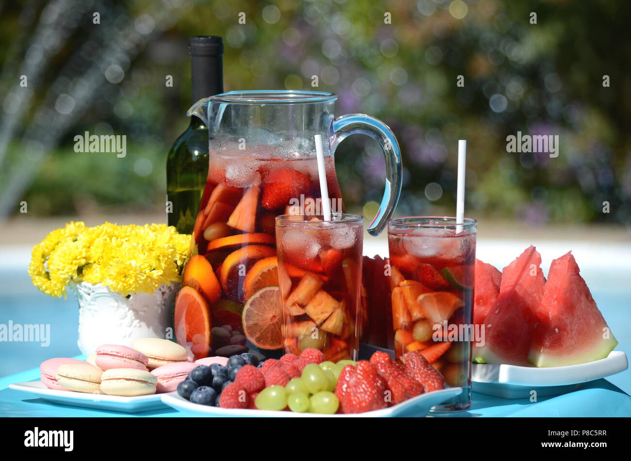 Pool party with sangria pitcher, fruit cocktails and refreshments