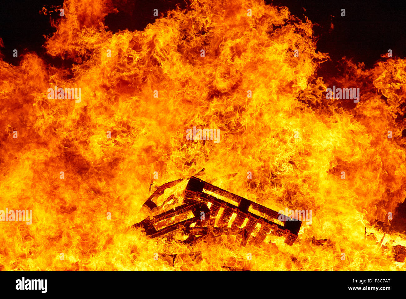 Burning fire, bonfire, fire fighting, flame ignition, embers, danger