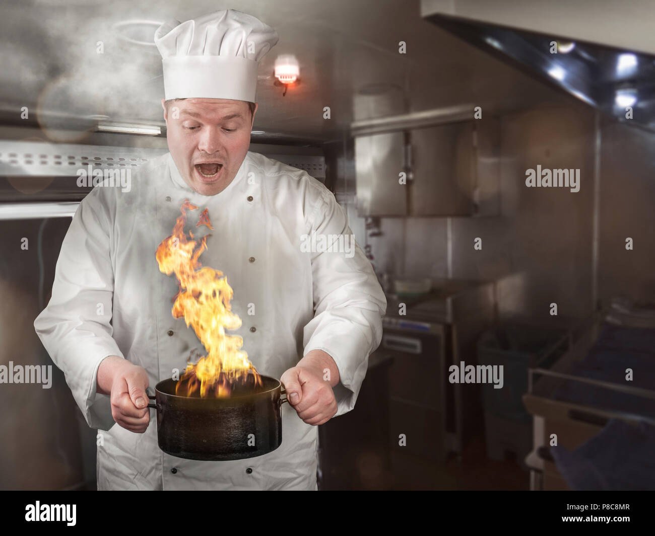 cook burns the food in the cooking pot Stock Photo