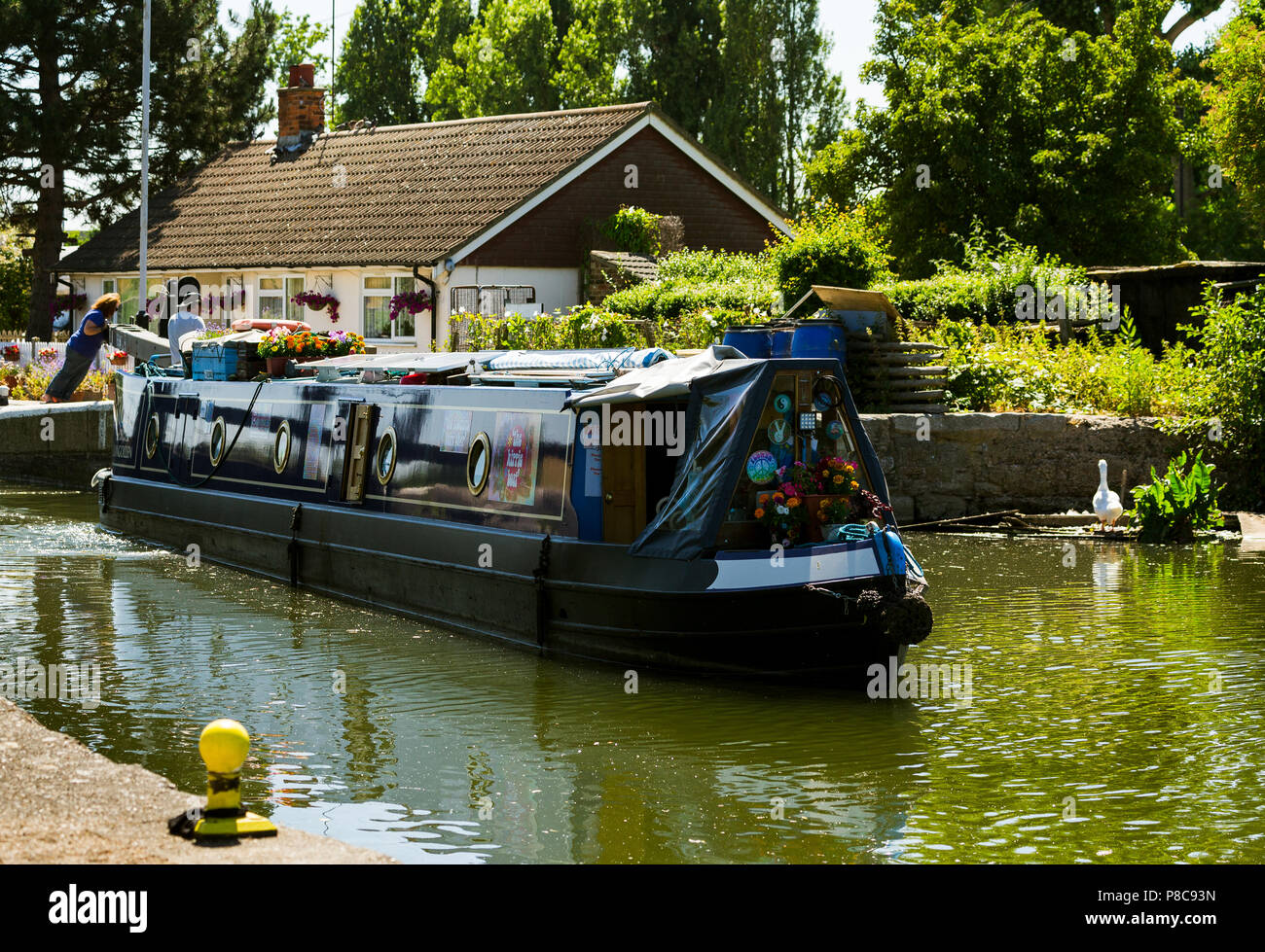 barge passing through Picketts lock on the Lee Valley waterway. London
