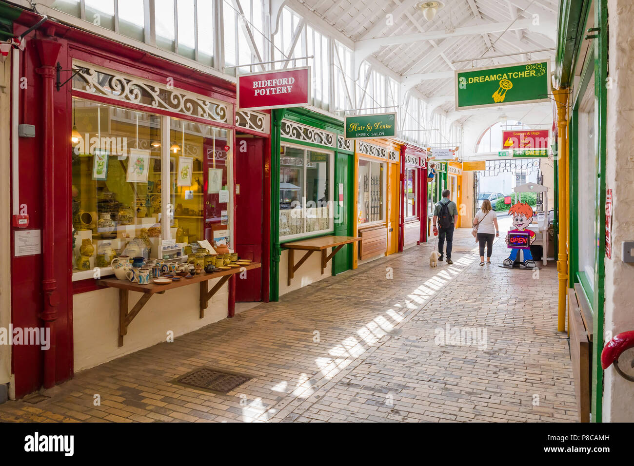 Bideford Pottery and other small shops in Butchers Row inthe old Pannier Market in Bideford Devon England UK Stock Photo