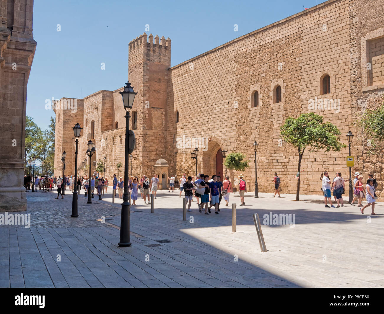 The walls of the Royal Palace of La Almudaina near  the Cathedral of Palma de Mallorca. Stock Photo