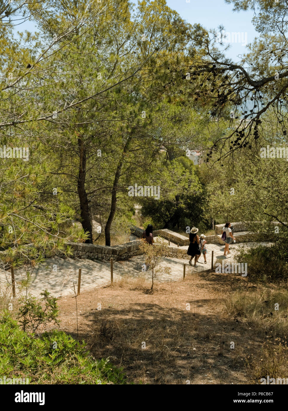 A footpath leading from Bellver Castle in Palma de Mallorca down through woodland into the city. Stock Photo