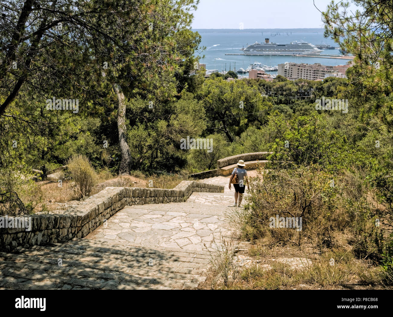 A footpath leading from Bellver Castle in Palma de Mallorca down through woodland into the city. Stock Photo