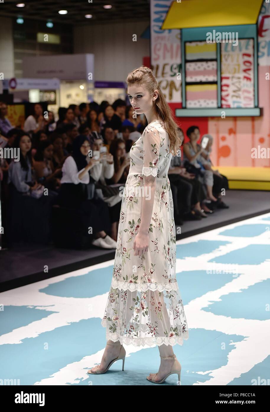 Hong Kong, China. 10th July, 2018. A model presents a creation made by