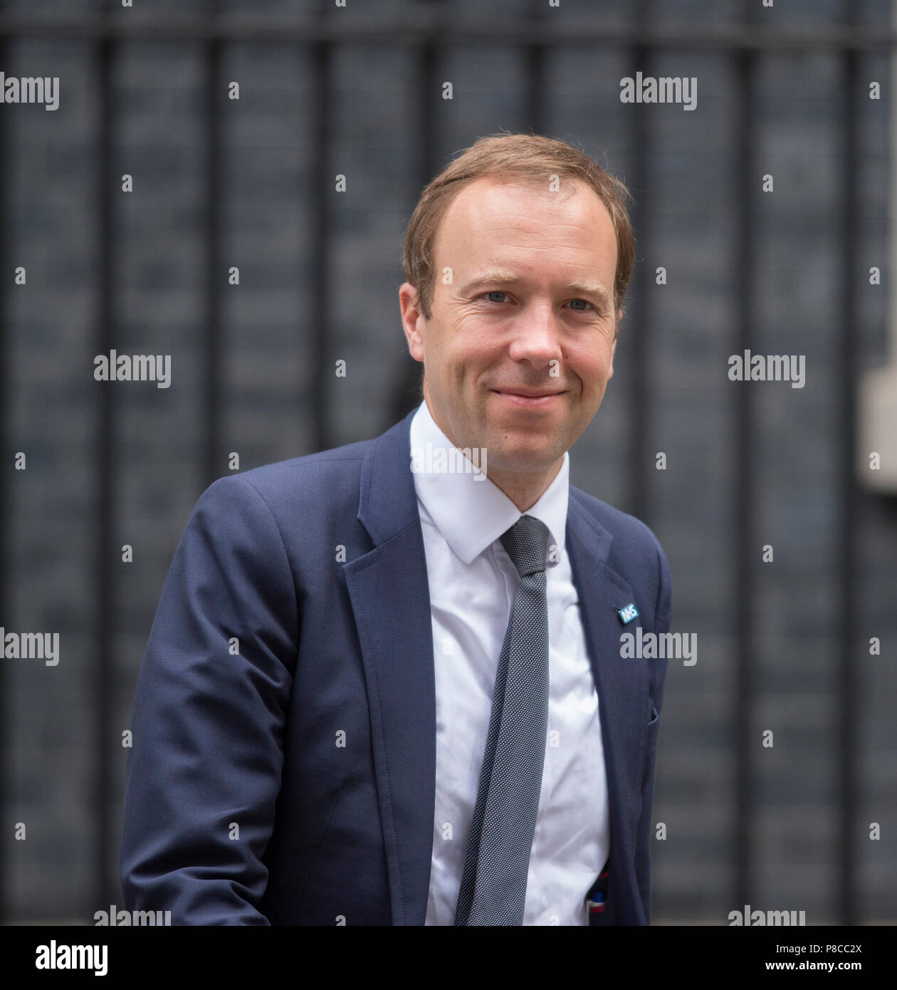 Downing Street, London, UK. 10 July 2018.  Matt Hancock, newly appointed Secretary of State for Health and Social Care leaves Downing Street wearing NHS badge after weekly cabinet meeting following a major reshuffle after David Davis and Boris Johnson resign over PM’s Brexit strategy. Credit: Malcolm Park/Alamy Live News. Stock Photo