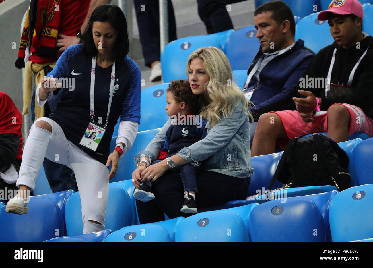 St. Petersburg, Russia. 10th July, 2018. soccer, World Cup, semi-finals,  France vs Belgium, St. Petersburg stadium. Camille Tytgat (C), wife of  French national player Raphael Varane, sitting in the stands before the