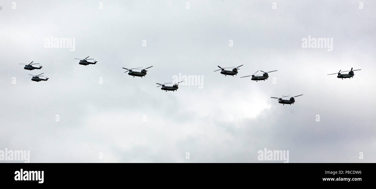 Puma and Chinook  Helecopters fly in formation over the Queen Elizabeth  Olympic Park, as part of the RAF Centenial Celbrations Stock Photo