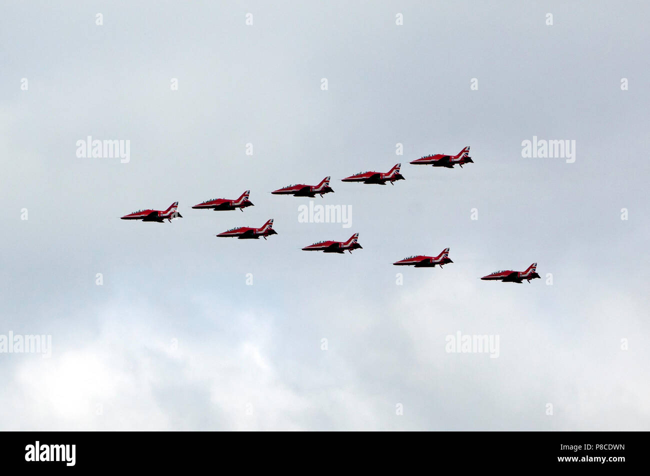 The Red Arrows fly in formation over the QE2 Olympic Park, as part of the RAF Centennial Celebrations Stock Photo