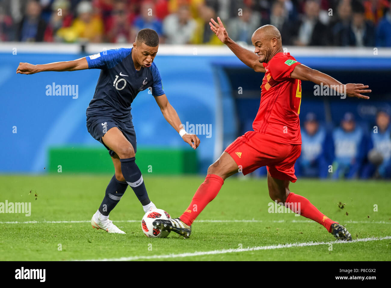 St. 10th July, 2018. Vincent Kompany of Belgium tackling Kylian Mbappe of France at St. Petersbourg Stadium during the semi finals between France and Belgium during the 2018 World Cup. Ulrik Pedersen/CSM/Alamy Live News Stock Photo