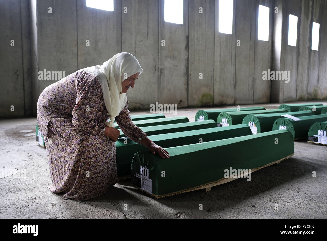Srebrenica, Srebrenica, Bosnia. 12th Oct, 2017. Europe, Bosnia, Srebrenica, July 10, 2018.Twenty-three years have passed since the Srebrenica Genocide took the lives of more than 7000 victims in Bosnia and Herzegovina between 1992 and 1995. This horrific event is commemorated annually on July 10 because on that day in 1995 Bosnian Serb forces, commanded by convicted war criminal General Ratko Mladic, executed more than 7000 Muslim-Bosniak men, boys and elderly who had sought safety in the region after the fall of Srebrenica. Furthermore, another 25,000 people were forcibly deported in an U Stock Photo
