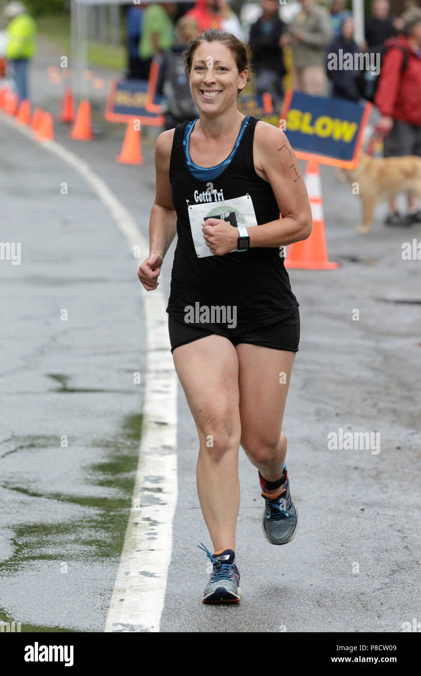 Whitney Burns during the run segment in the 2018 Hague Endurance Festival Sprint Triathlon Stock Photo