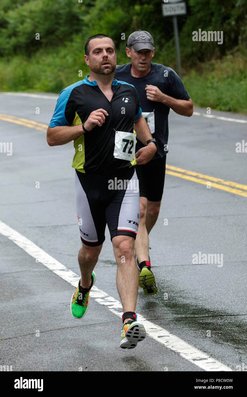 Jeffrey Burns (#72) and Mark Lucier  during the run segment in the 2018 Hague Endurance Festival Sprint Triathlon Stock Photo