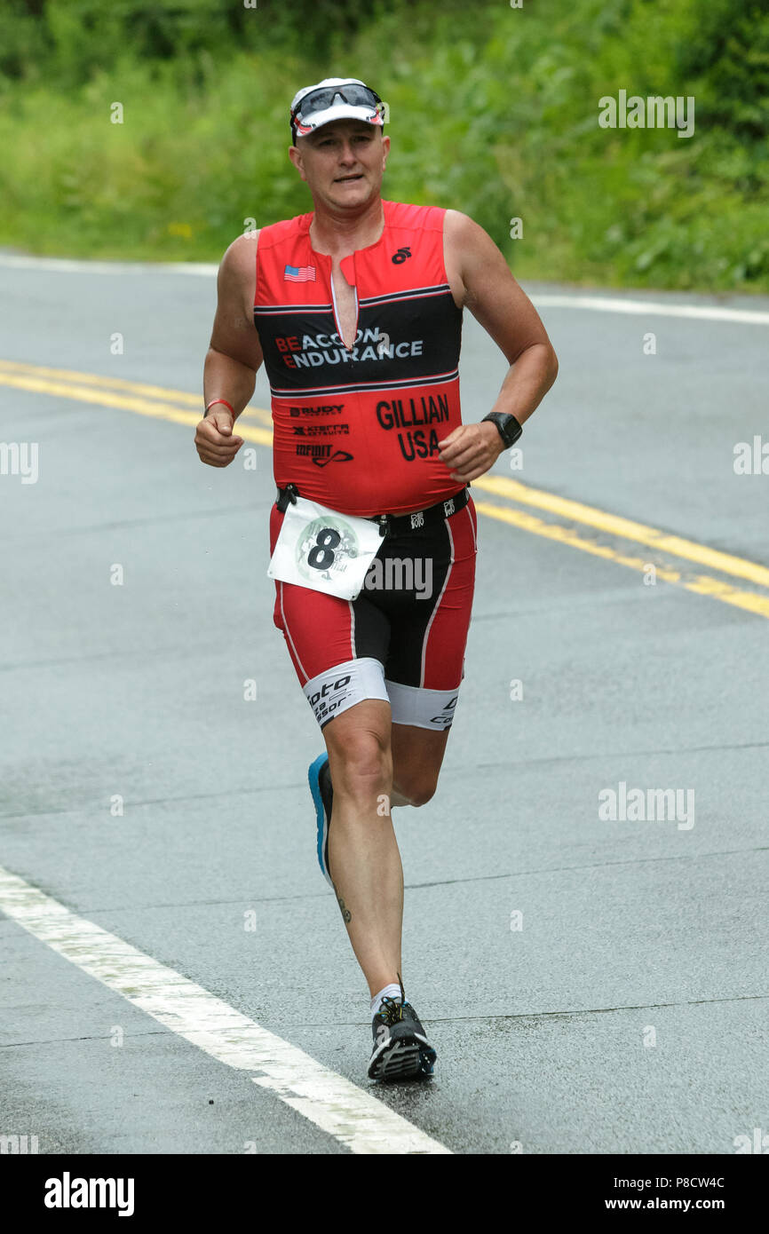 Male competitor during the run segment in the 2018 Hague Endurance Festival Olympic Triathlon Stock Photo