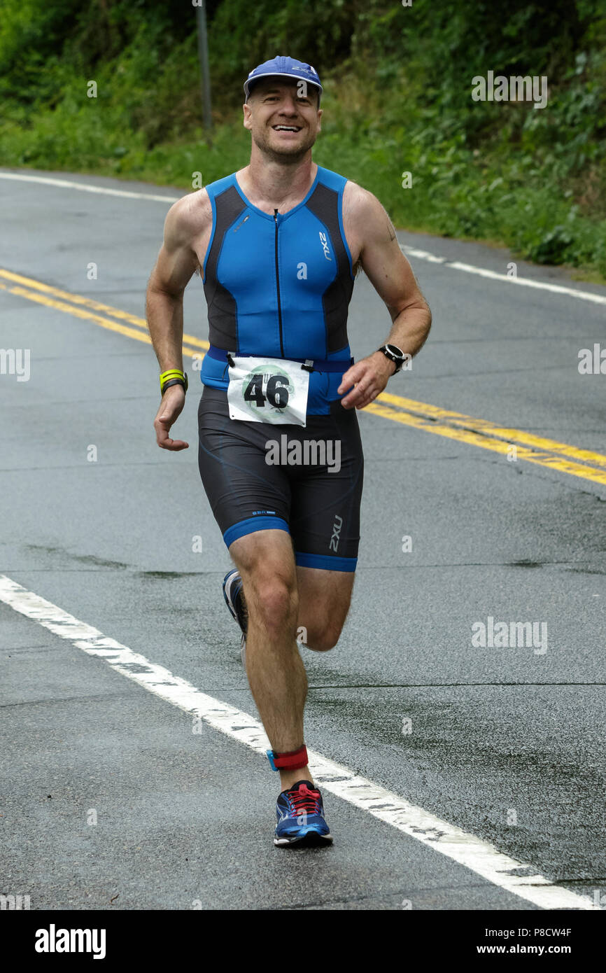Male competitor during the run segment in the 2018 Hague Endurance Festival Olympic Triathlon Stock Photo