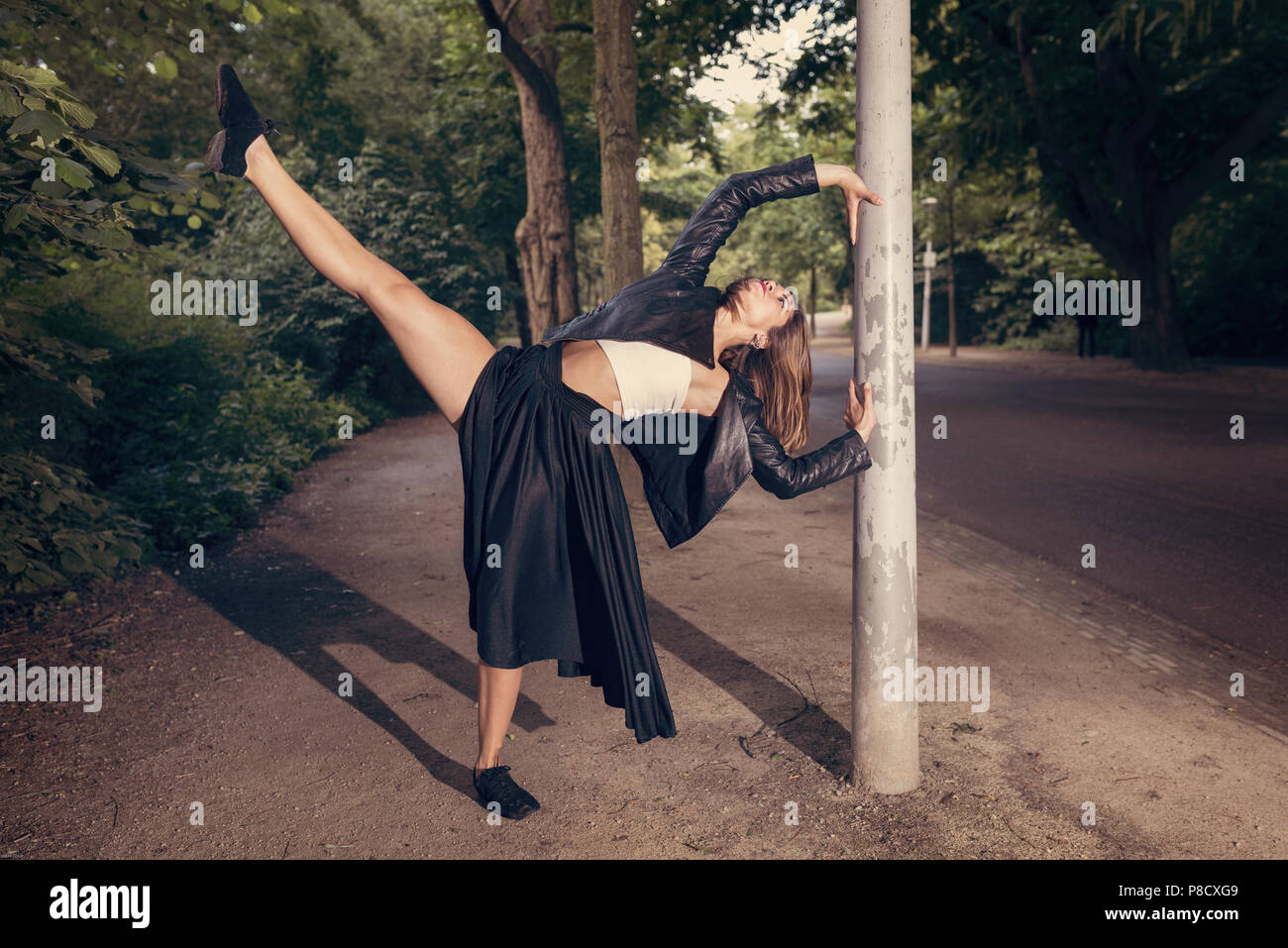 Woman dancing outdoors hi-res stock photography and images - Alamy