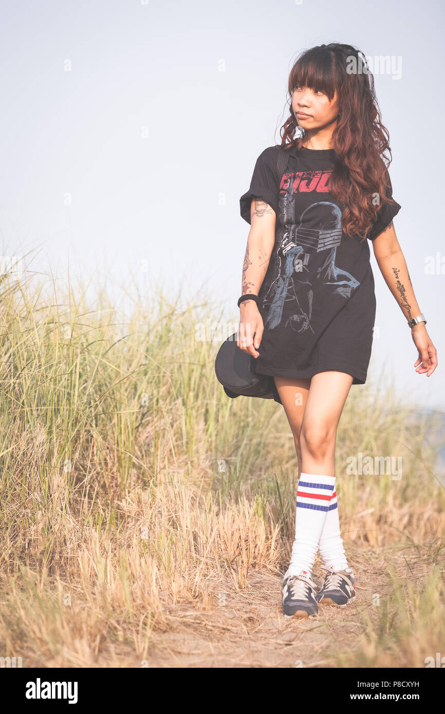 A young Asian (Filipino) woman wears casual clothes in various spots around  Ontario Stock Photo - Alamy