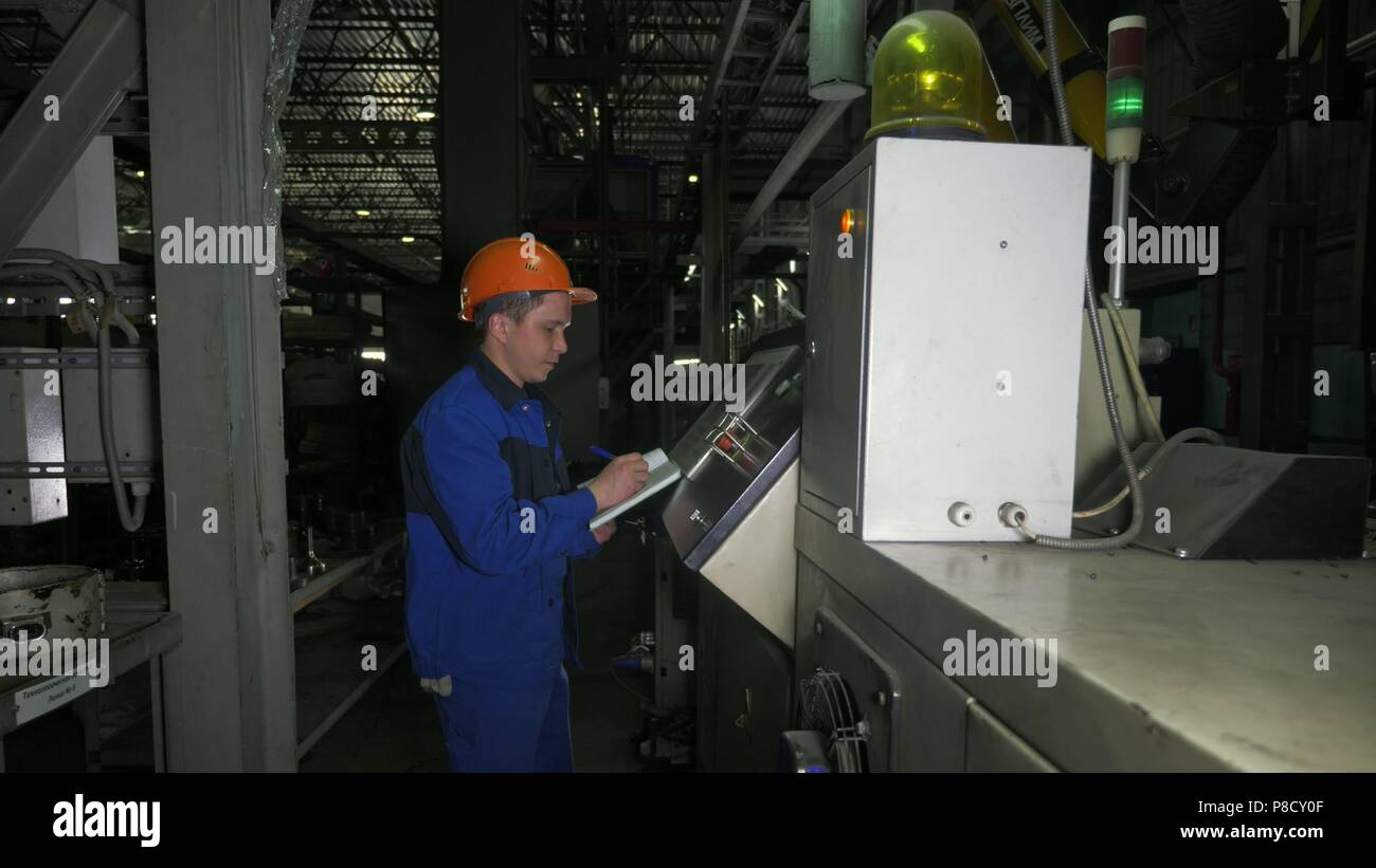 RUSSIA, ANGARSK JUNE 8, 2018 Operator monitors control panel of