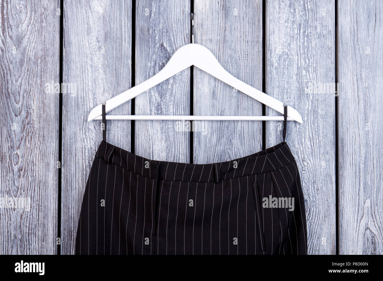 Close up black business pants on hanger Stock Photo Alamy