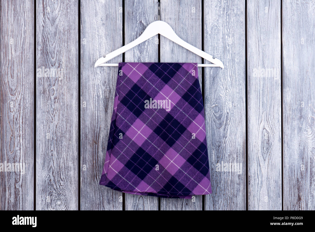 Flat lay violet checkered skirt Stock Photo - Alamy