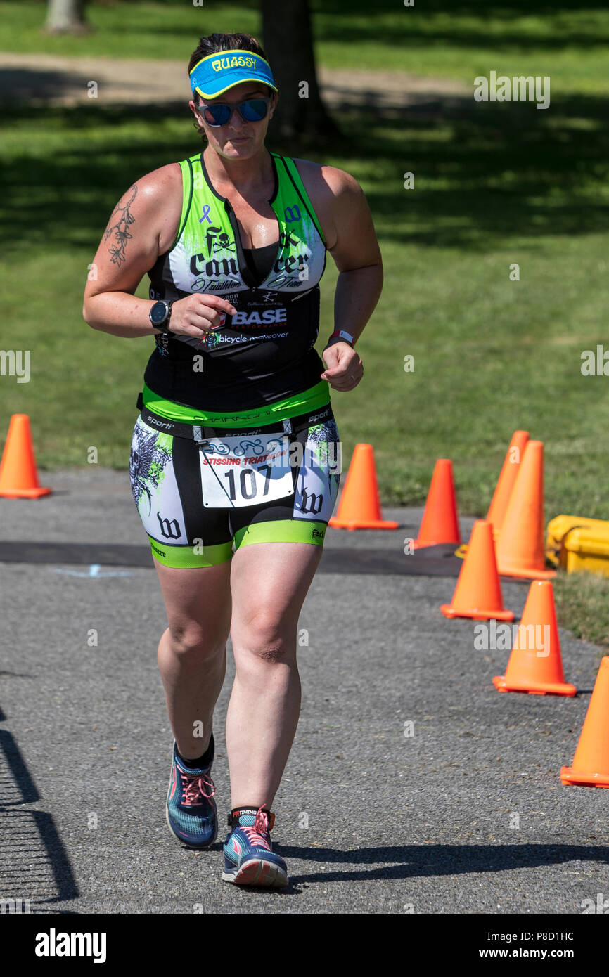 Emily Rydin competing in the run segment in the 2018 Stissing Triathlon Stock Photo