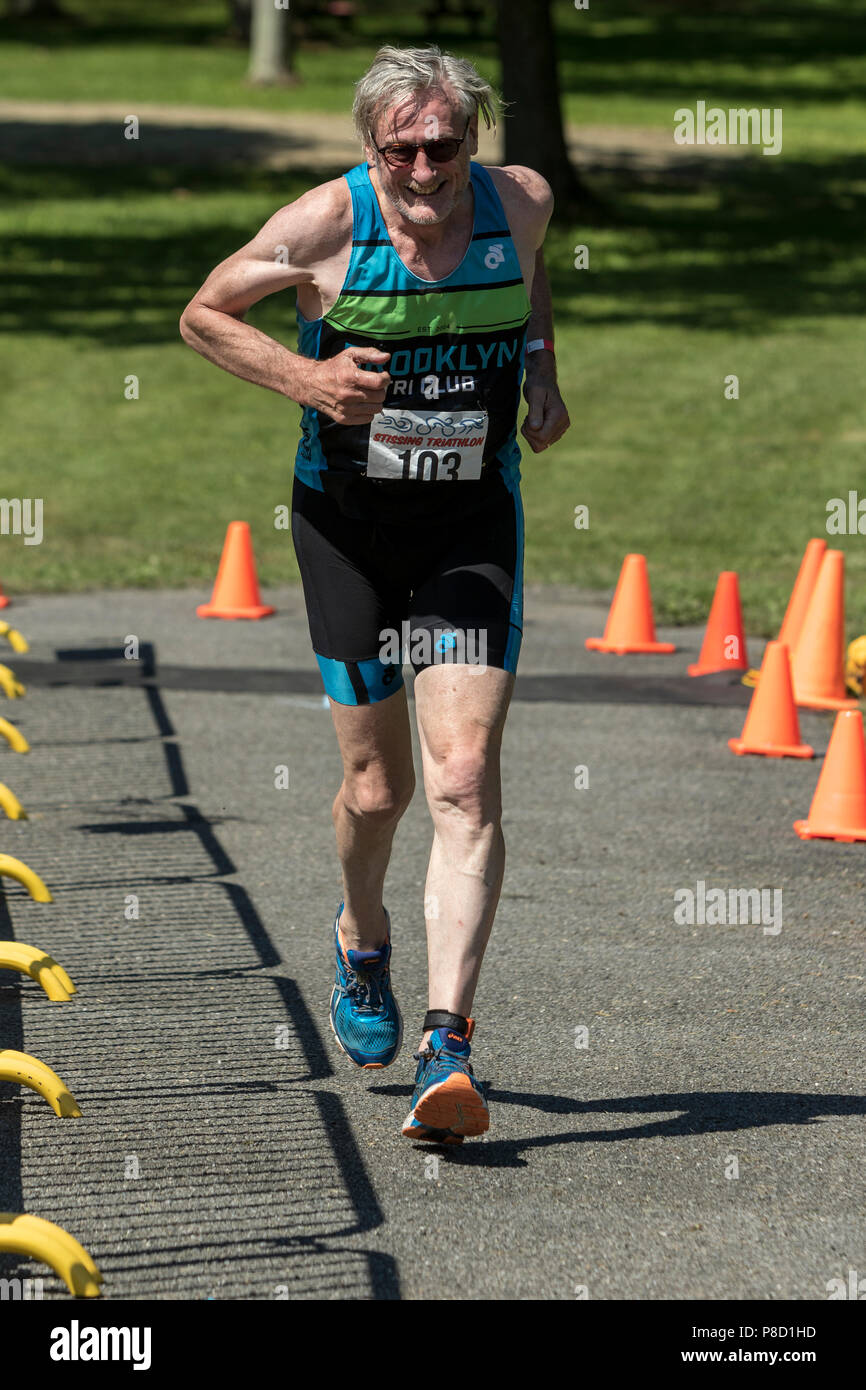 Richard Brotherton competiting in the run segment in the 2018 Stissing Triathlon Stock Photo