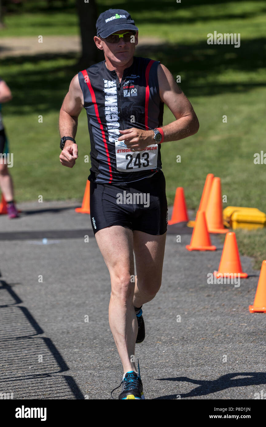 Anthony Stephens competiting in the run segment in the 2018 Stissing Triathlon Stock Photo