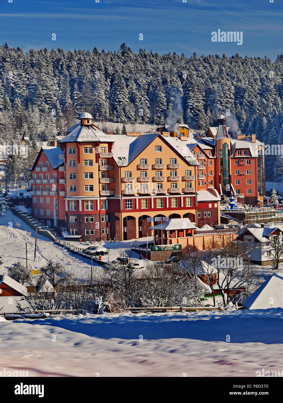 Large, multi-storey residential complex in winter. Around everything in ...