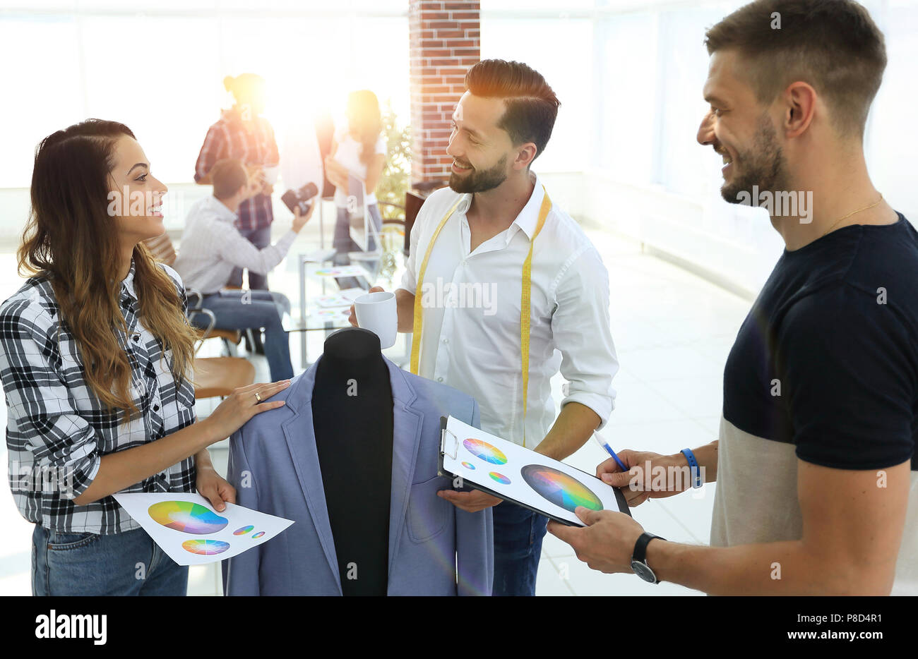 Fashion designer discuss color hi-res stock photography and images - Alamy