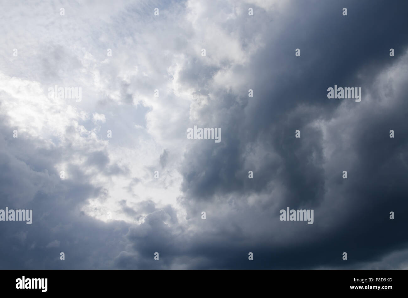 Background blue sky with gray cumulus clouds Stock Photo - Alamy