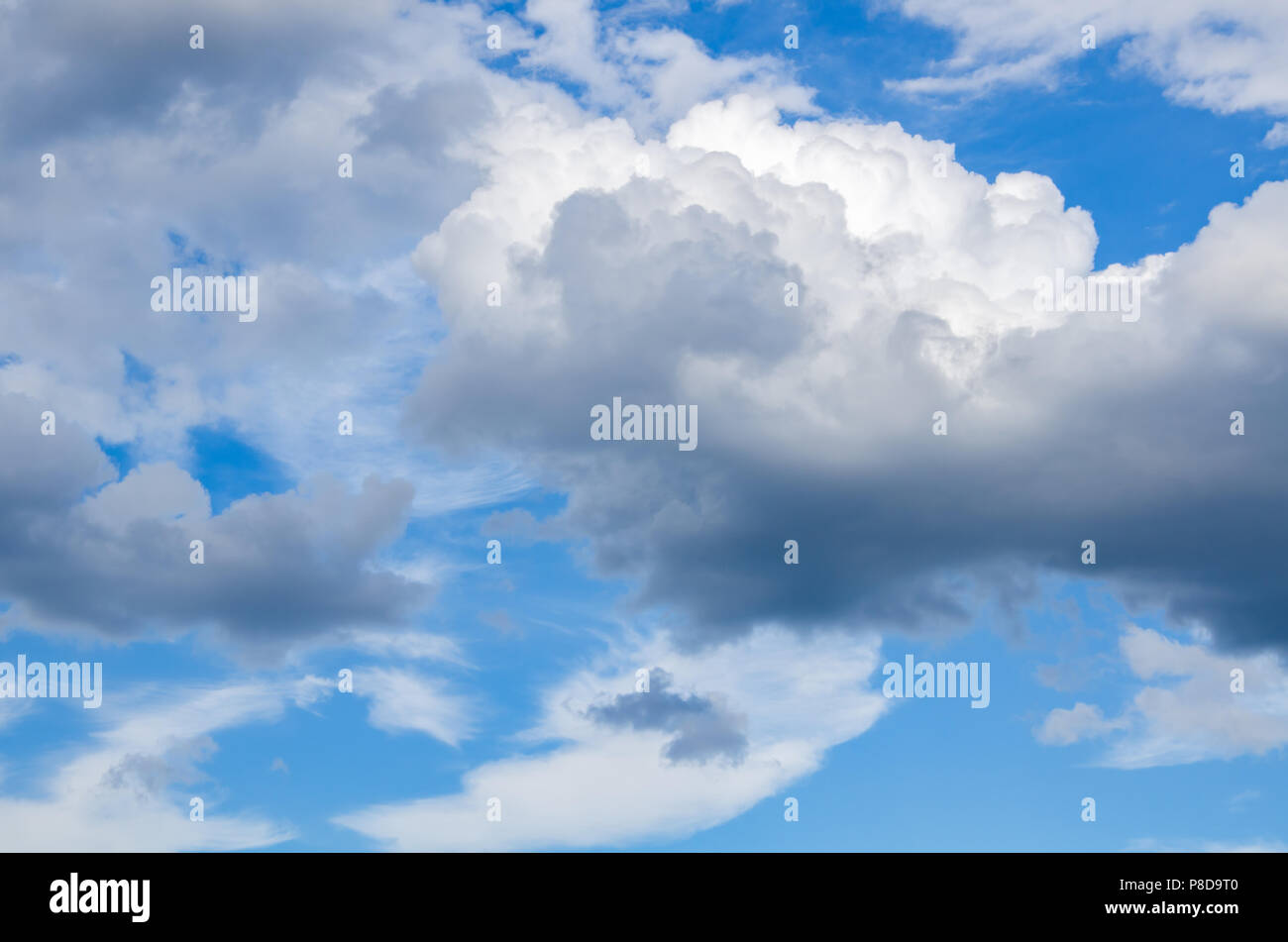 Blue sky with white abstract clouds Stock Photo - Alamy