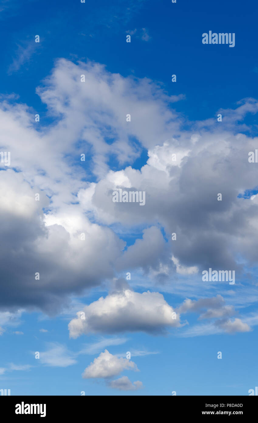 Blue sky with white abstract clouds Stock Photo - Alamy