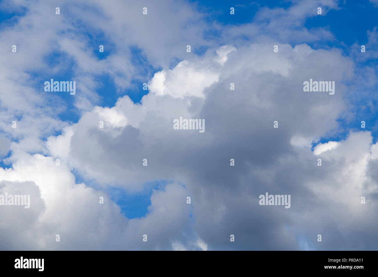 Blue sky with white abstract clouds Stock Photo