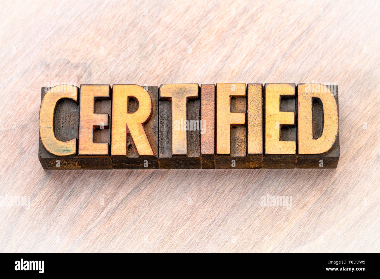 certified word abstract in vintage letterpress wood type Stock Photo