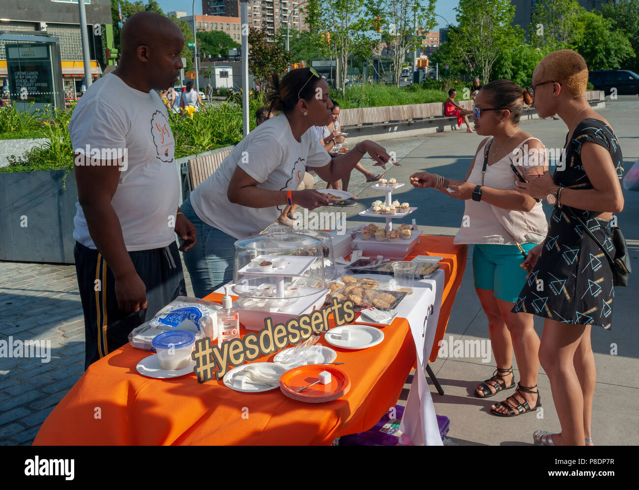 “Yes Desserts” booth during the opening evening of the Bronx Night Market in Fordham Plaza in the Bronx in New York on Saturday, June 30, 2018. The first-ever foodie market in the Bronx features vendors from the borough serving dishes featuring the polyglot of ethnicities tha make up the borough. The market will take place on the last Saturday of the month until October. (© Richard B. Levine) Stock Photo