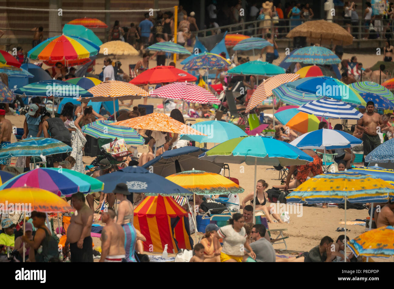 Thousands Of Beachgoers Try To Beat The Oppressive Heat And Escape To Coney Island In Brooklyn In New York And Literally Pack The Beach On Sunday July 1 18 Sunday Was The