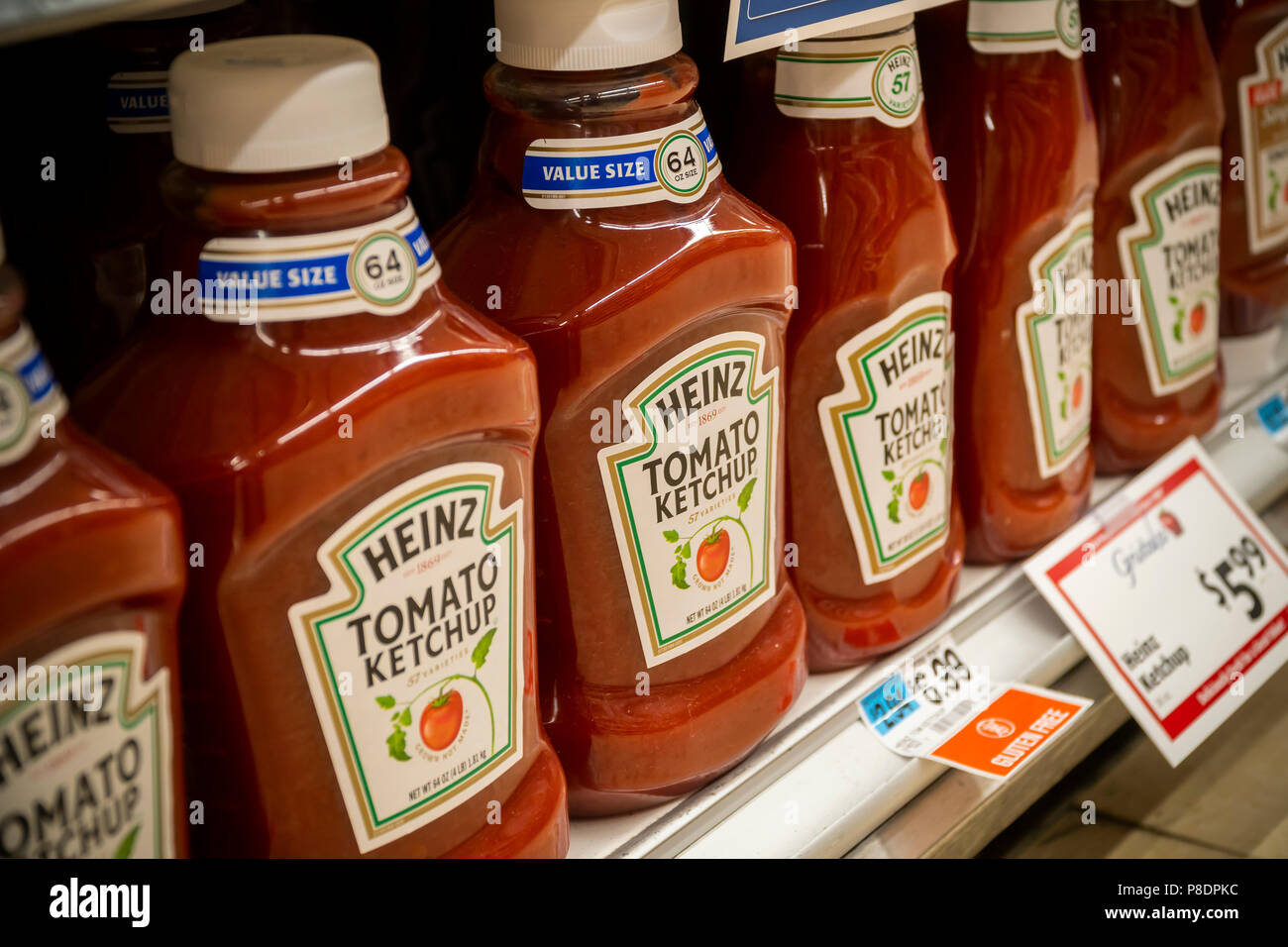 Bottles of Kraft Heinz ketchup on a supermarket shelf in New York on Tuesday July 3, 2018. In retaliation for the Trump administration instituting tariffs on Canadian steel, Canada has instituted tariffs on a number of products including a 10% tariff on ketchup. (© Richard B. Levine) Stock Photo