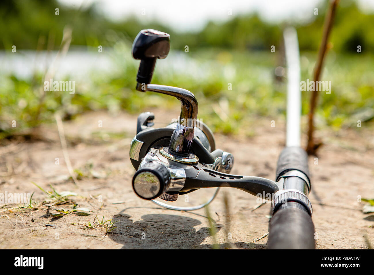Fisherman's reel, mounted on a fishing rod. Feeder fishing in English