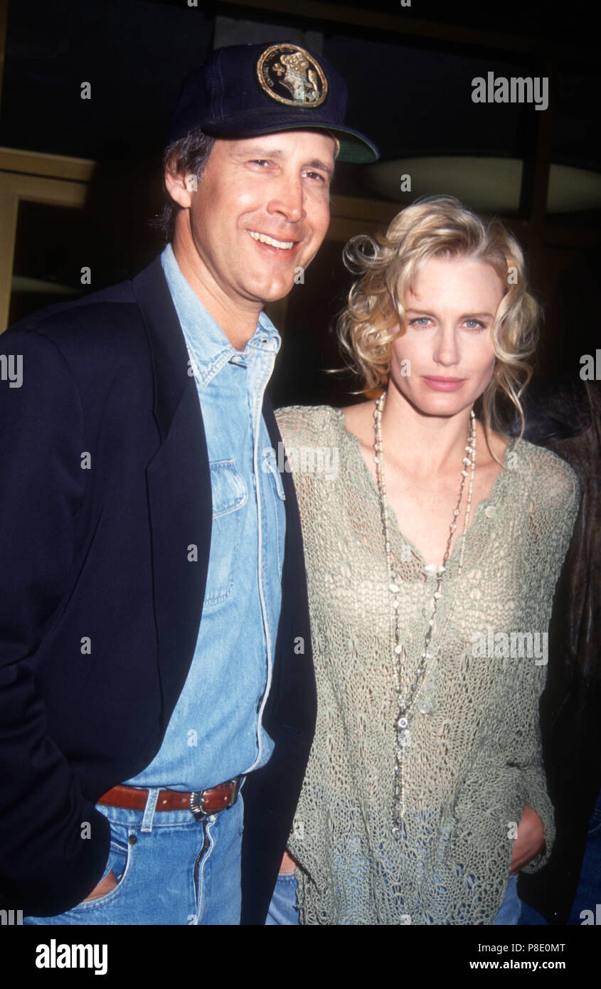 WESTWOOD, CA - FEBRUARY 25: (L-R) Actor Chevy Chase and actress Daryl Hannah attend 'Memoirs of an Invisible Man' Premiere on February 25, 1992 at Mann's National Theater in Westwood, California. Photo by Barry King/Alamy Stock Photo Stock Photo