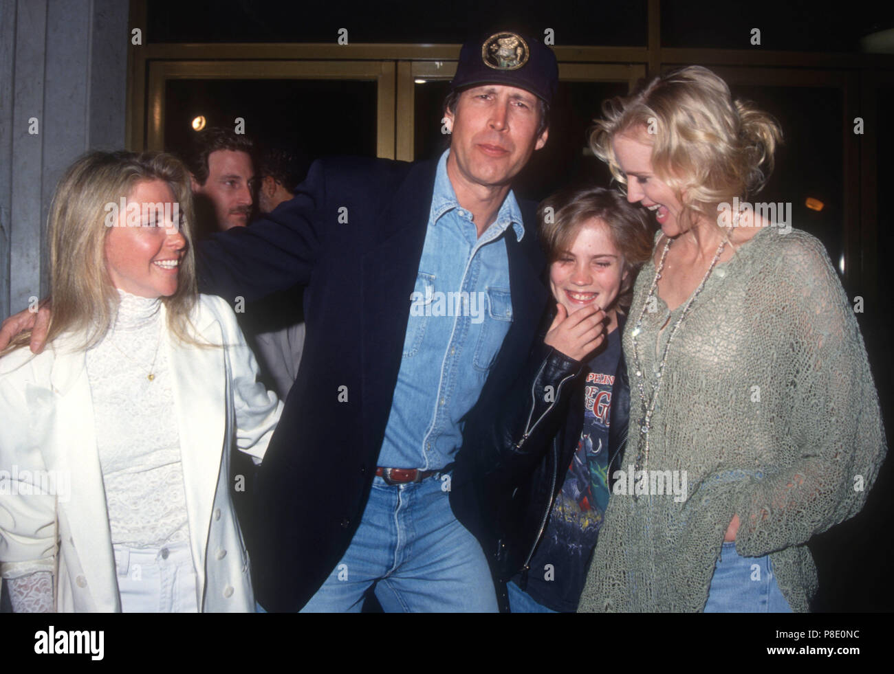 WESTWOOD, CA - FEBRUARY 25: Jayni Chase and husband Actor Chevy Chase, actress Daryl Hannah and nephew Jeremiah attend 'Memoirs of an Invisible Man' Premiere on February 25, 1992 at Mann's National Theater in Westwood, California. Photo by Barry King/Alamy Stock Photo Stock Photo