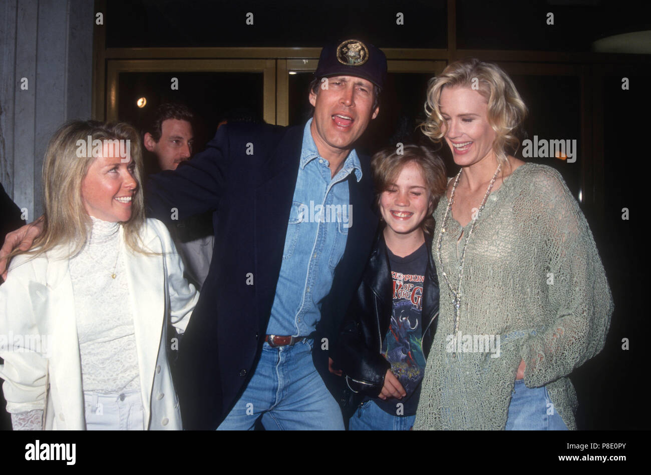 WESTWOOD, CA - FEBRUARY 25: Jayni Chase and husband Actor Chevy Chase, actress Daryl Hannah and nephew Jeremiah attend 'Memoirs of an Invisible Man' Premiere on February 25, 1992 at Mann's National Theater in Westwood, California. Photo by Barry King/Alamy Stock Photo Stock Photo