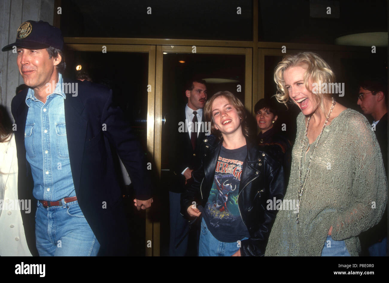 WESTWOOD, CA - FEBRUARY 25: Actor Chevy Chase, actress Daryl Hannah and nephew Jeremiah attend 'Memoirs of an Invisible Man' Premiere on February 25, 1992 at Mann's National Theater in Westwood, California. Photo by Barry King/Alamy Stock Photo Stock Photo