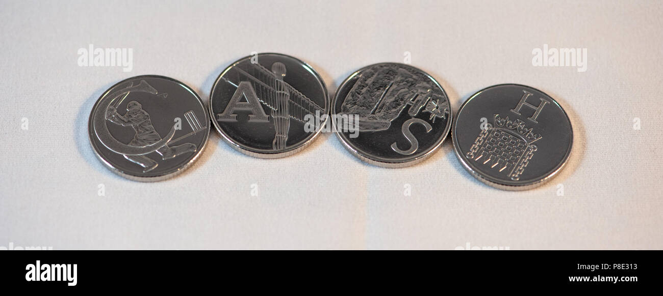 The word 'CASH' spelt out with new UK 10pence pieces Stock Photo