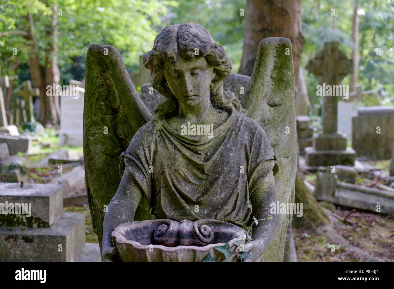 Angel statue on grave, Highgate Cemetery, London Stock Photo Alamy