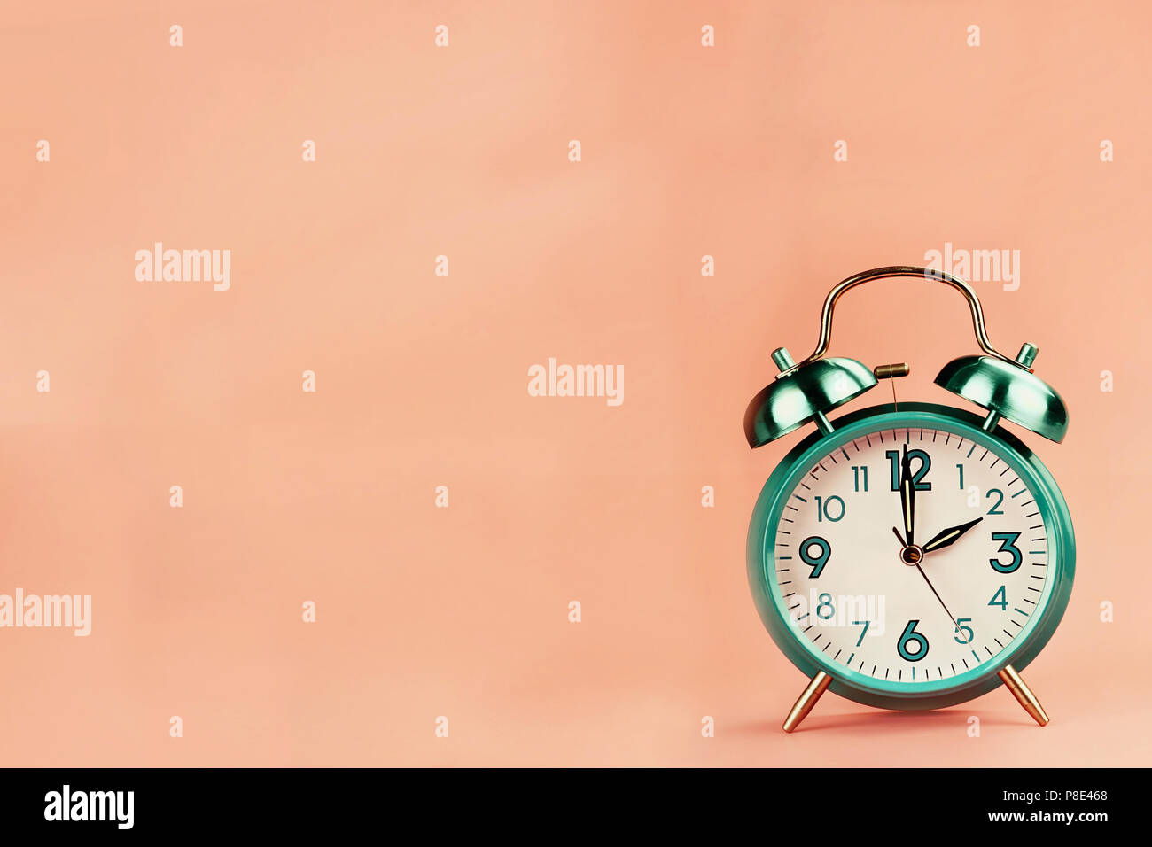Vintage style alarm clock with room for free background space for text. Stock Photo