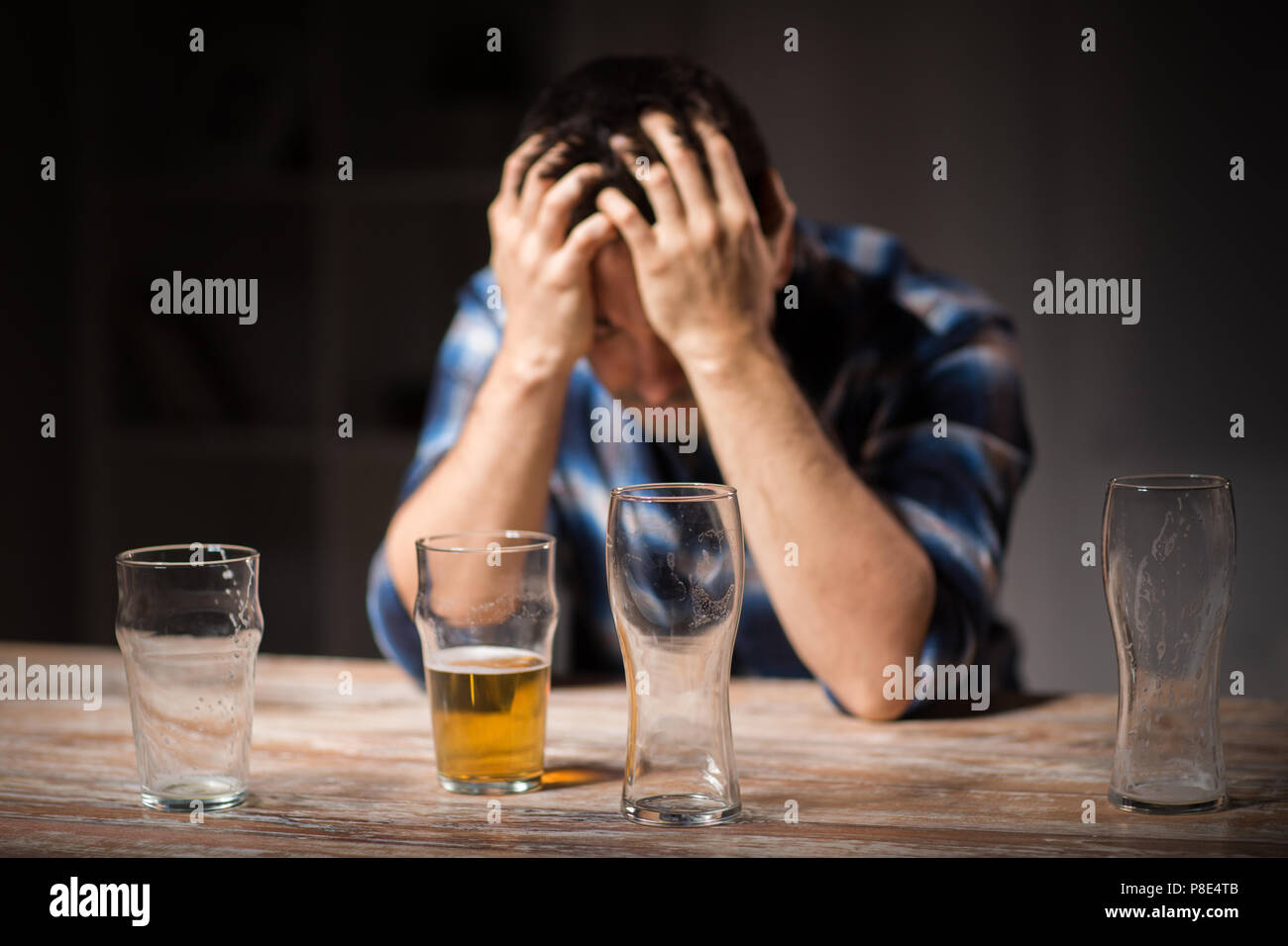 alcoholic drinking beer from glass at night Stock Photo Alamy