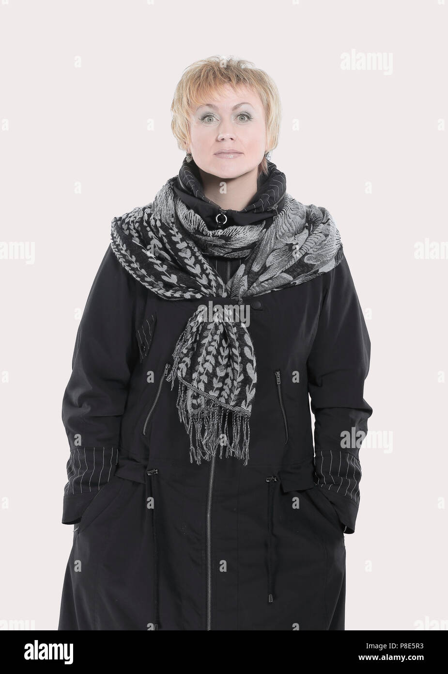 Cold woman inside scarf coat hi-res stock photography and images - Alamy