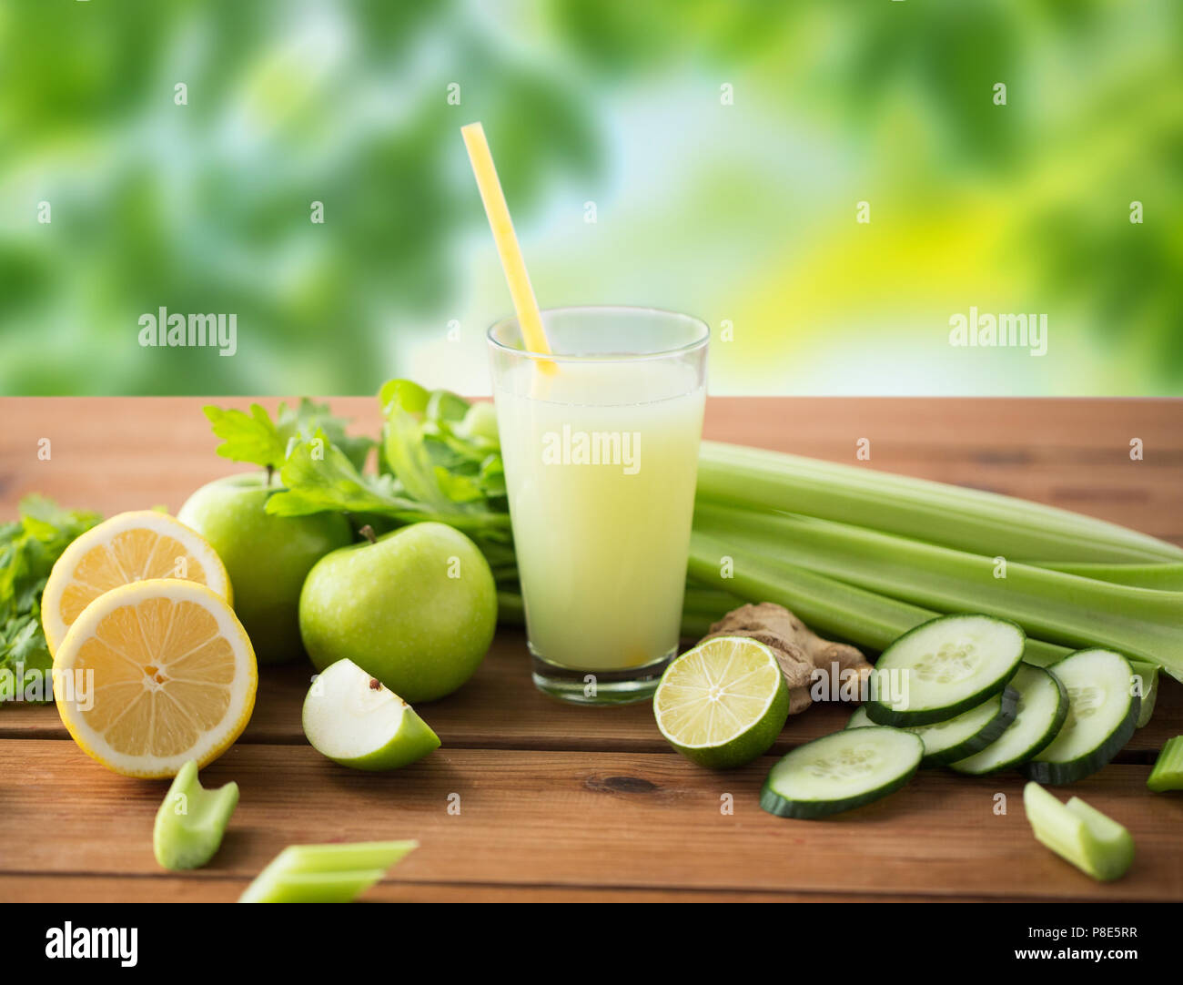 glass of green juice with fruits and vegetables Stock Photo Alamy